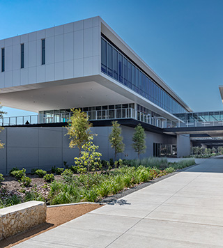 Image of a three-story campus building used for classroom and lab space.