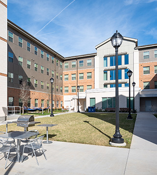 Image of a multi-story campus residence hall.