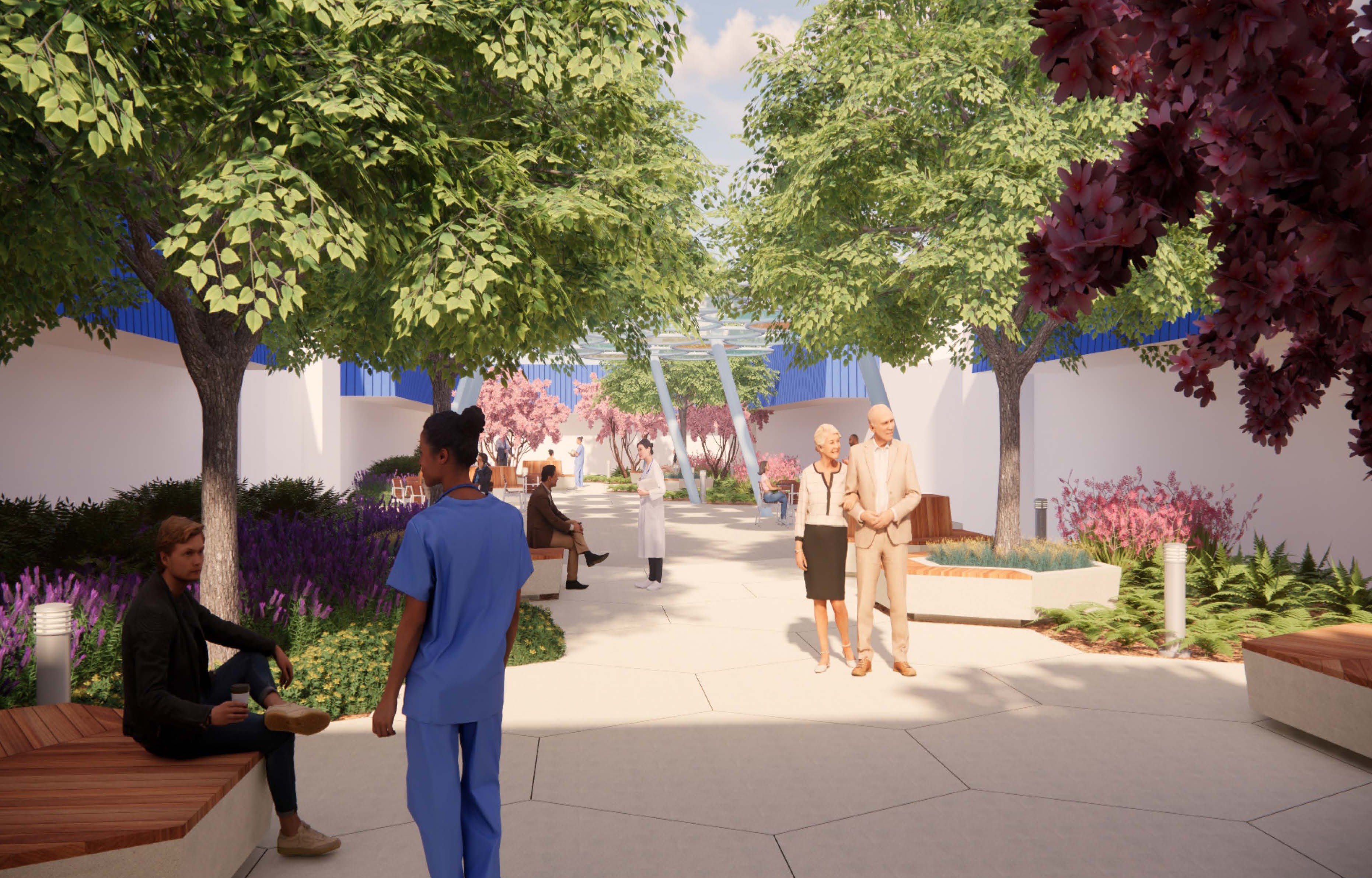Landscaped medical center courtyard with trees, flowering plants, walking paths, benches, and people sitting and walking through the space.