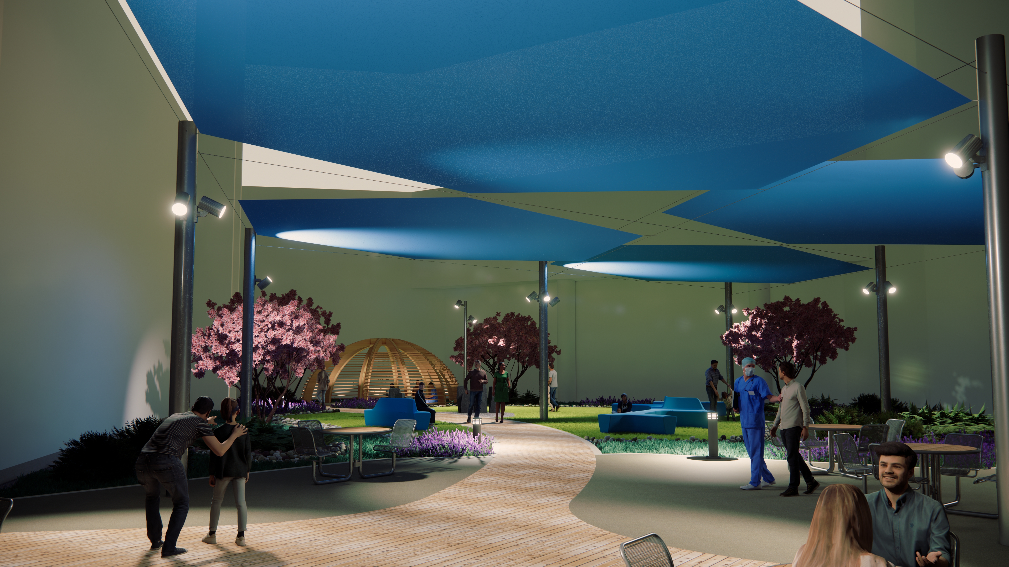 Rendered medical center courtyard at night with blue shade canopies, flowering trees, landscaped gardens, curved walkways, seating areas, and people walking and gathering.