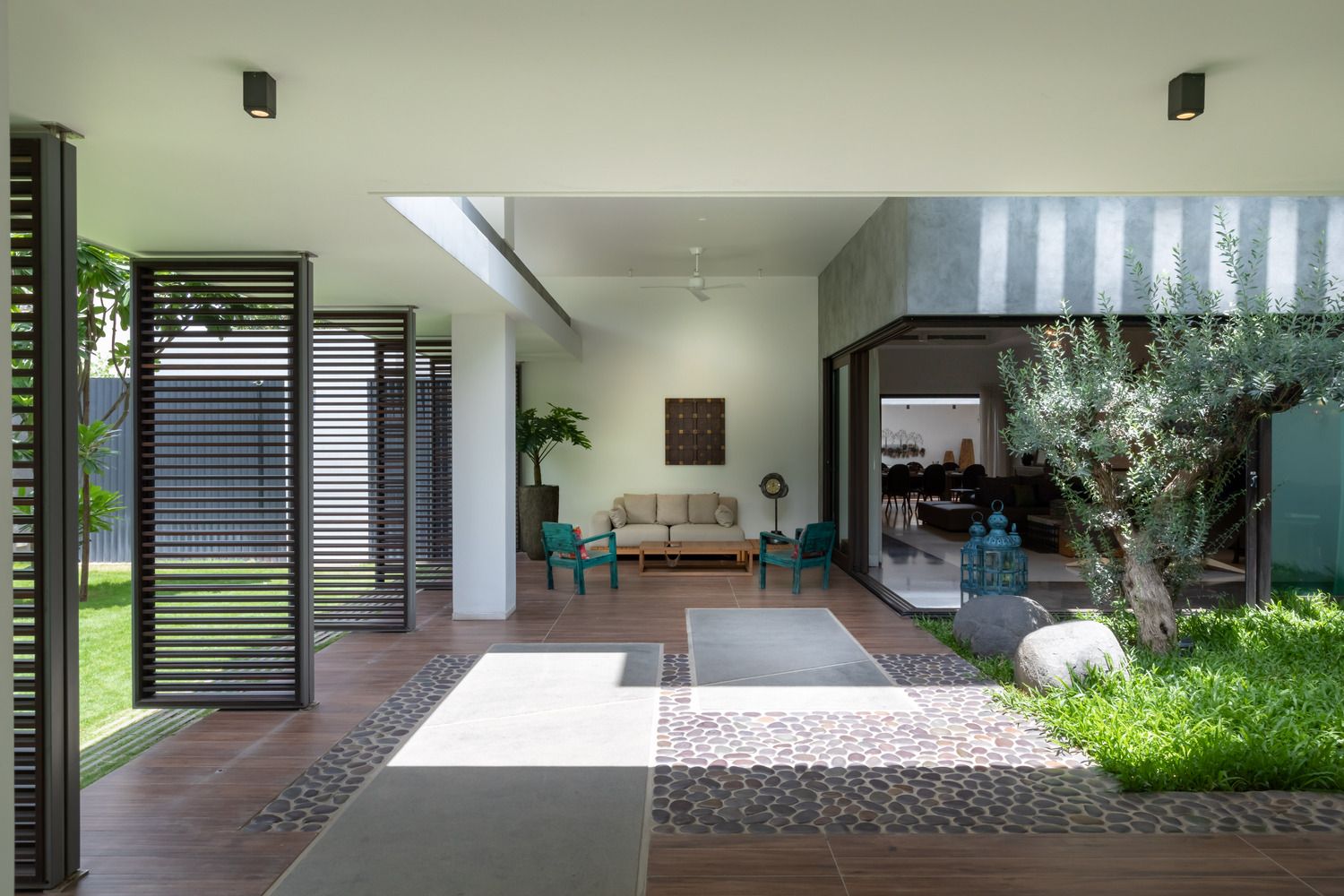 courtyard villa with a couch and chairs