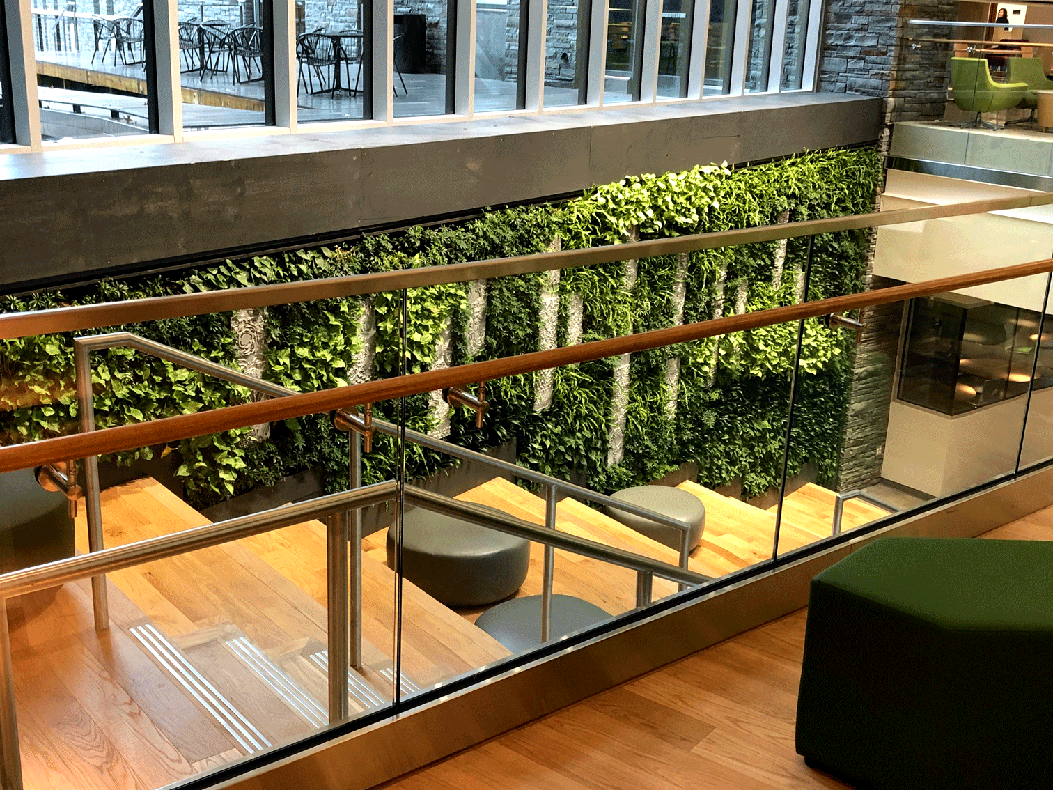 Stairwell with a live green plant wall