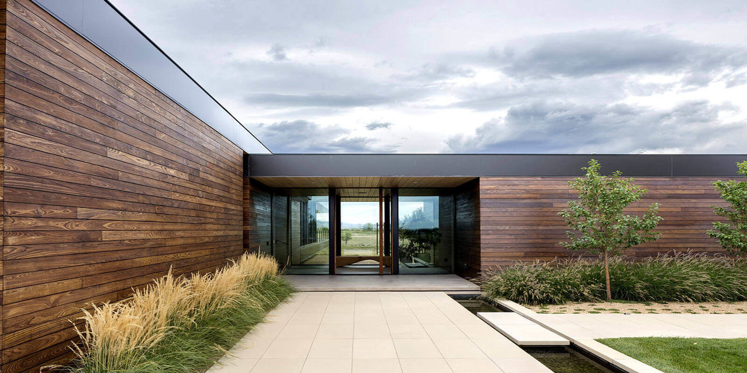 wooden building with an walkway to the outdoors